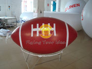 La bola de rugbi inflable roja del deporte de la publicidad hincha con la impresión digital total para el partido exportadores 